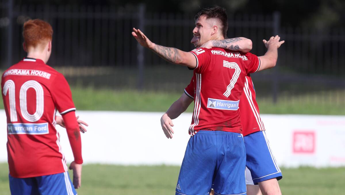 IN FOCUS: Albion Park striker Cameron Morgan celebrates with his teammates after scoring a goal in 2020. Picture: Sylvia Liber