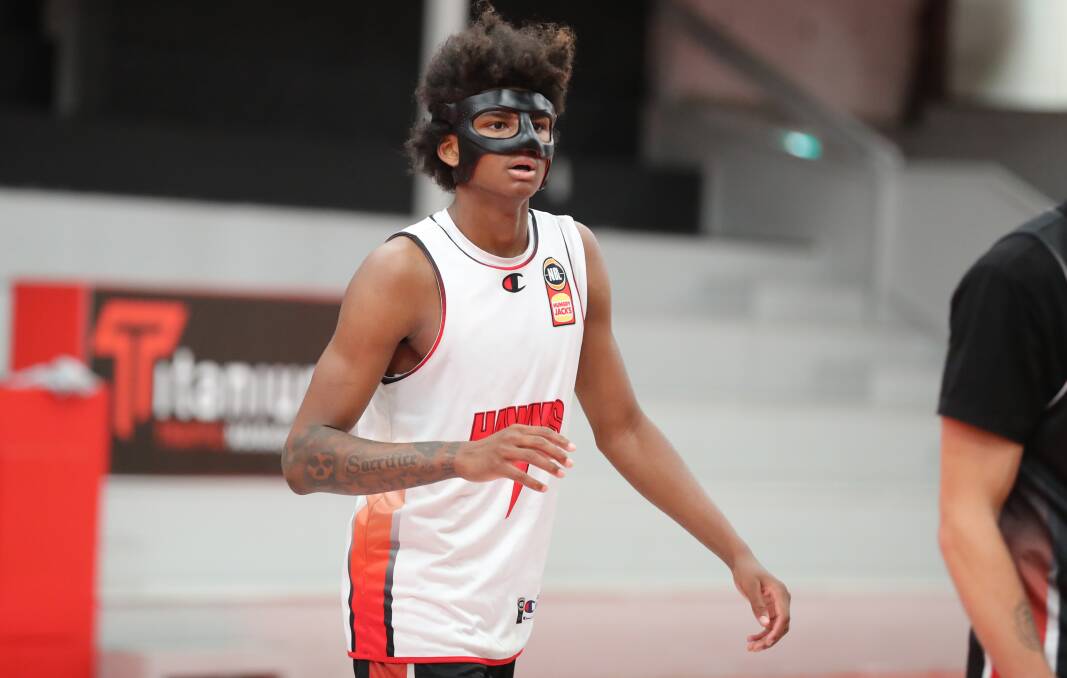 Next Star AJ Johnson wore a face mask at Illawarra's training session at the Snakepit on Wednesday. Picture by Robert Peet