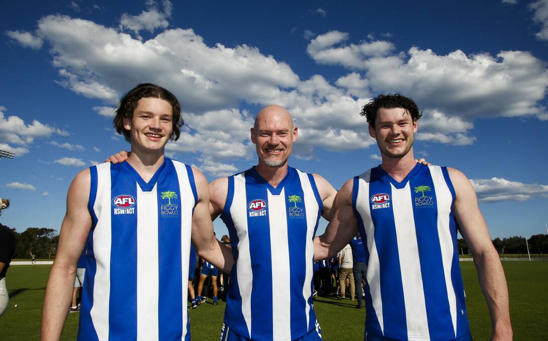 FAMILY AFFAIR: Peter Veerhuis and his sons Kyle (left) and Leroy celebrate together after Figtree won the AFL South Coast premiership on Saturday. Picture: Anna Warr