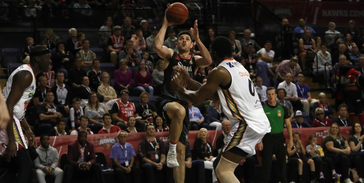 EXPLOSIVE: Hawks captain Todd Blanchfield on the attack against the Cairns Taipans on Monday night. Picture: Sylvia Liber