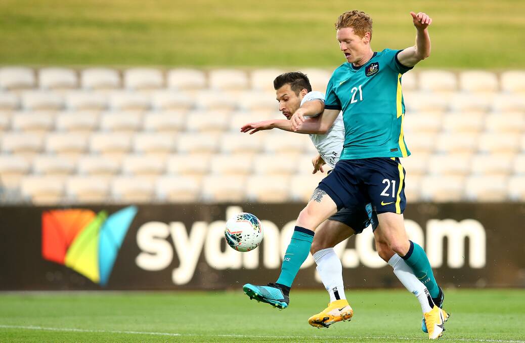 IN FRONT: Olyroos defender Kye Rowles (right) competes for the ball during a match against Sydney FC last November. Picture: Jason McCawley/Getty Images