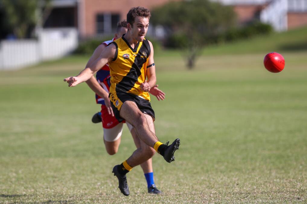 MOVING FORWARD: Northern Districts player Samuel Conte kicks to a support. Picture: Adam McLean
