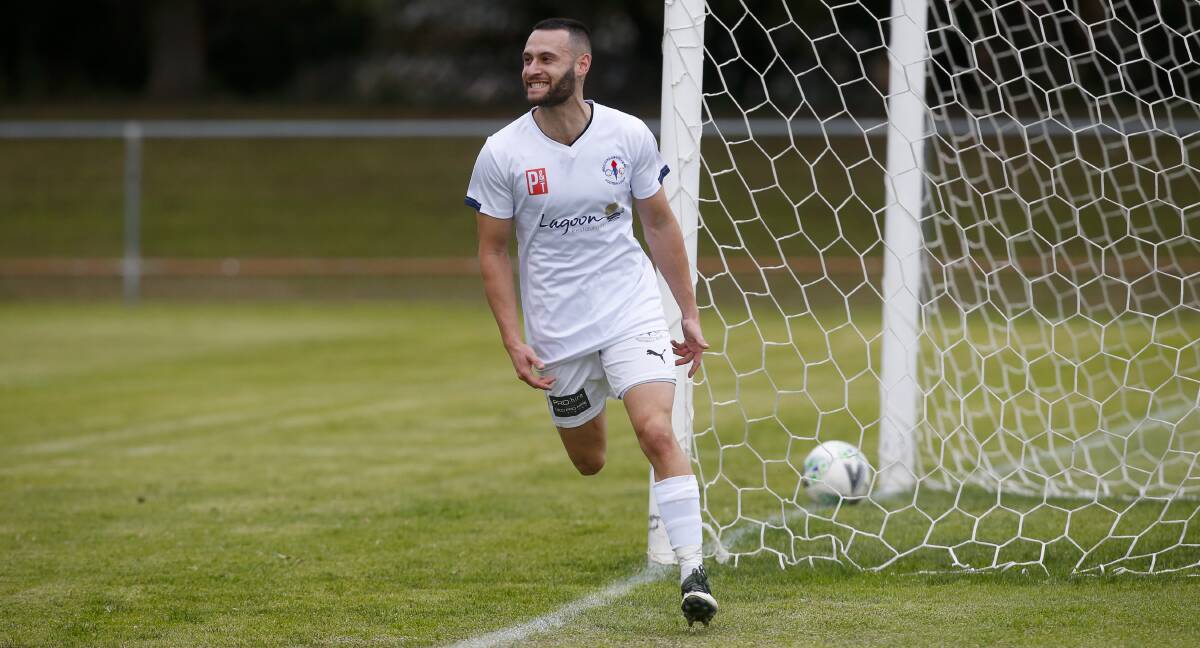 PLEASED: Wollongong Olympic's Matthew Floro celebrates after scoring a goal last season. Picture: Anna Warr