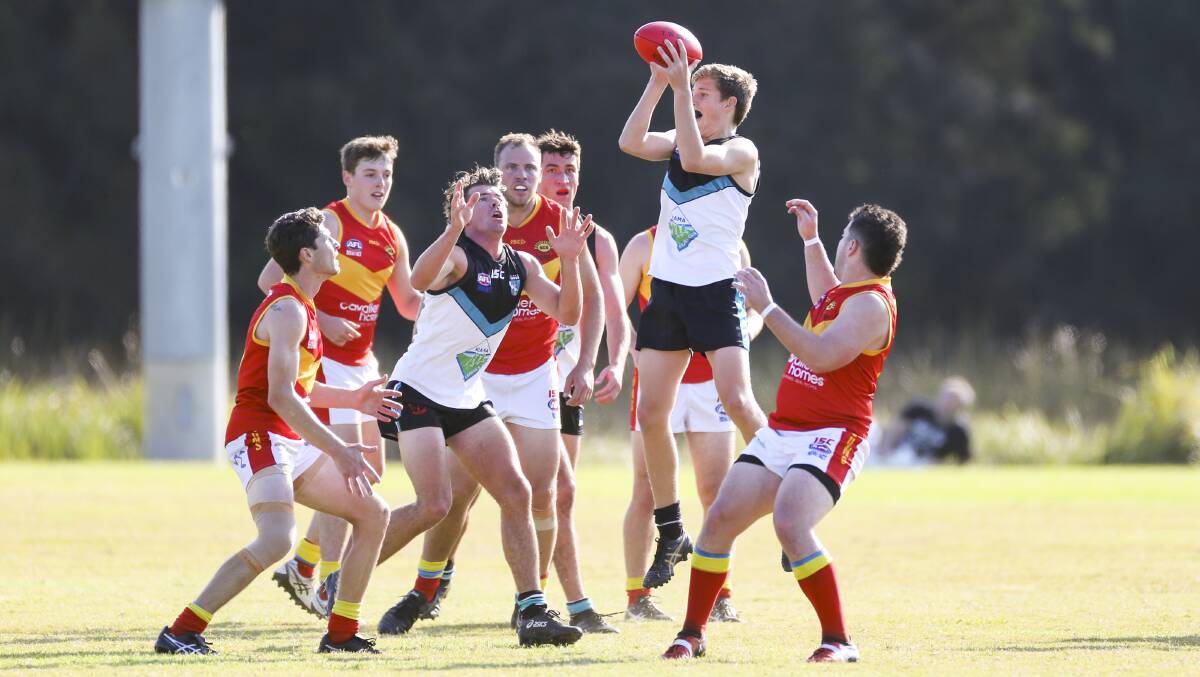 All of the action from Kiama's AFL South Coast win over Shellharbour at Myimbarr Oval on Saturday. Pictures: Anna Warr