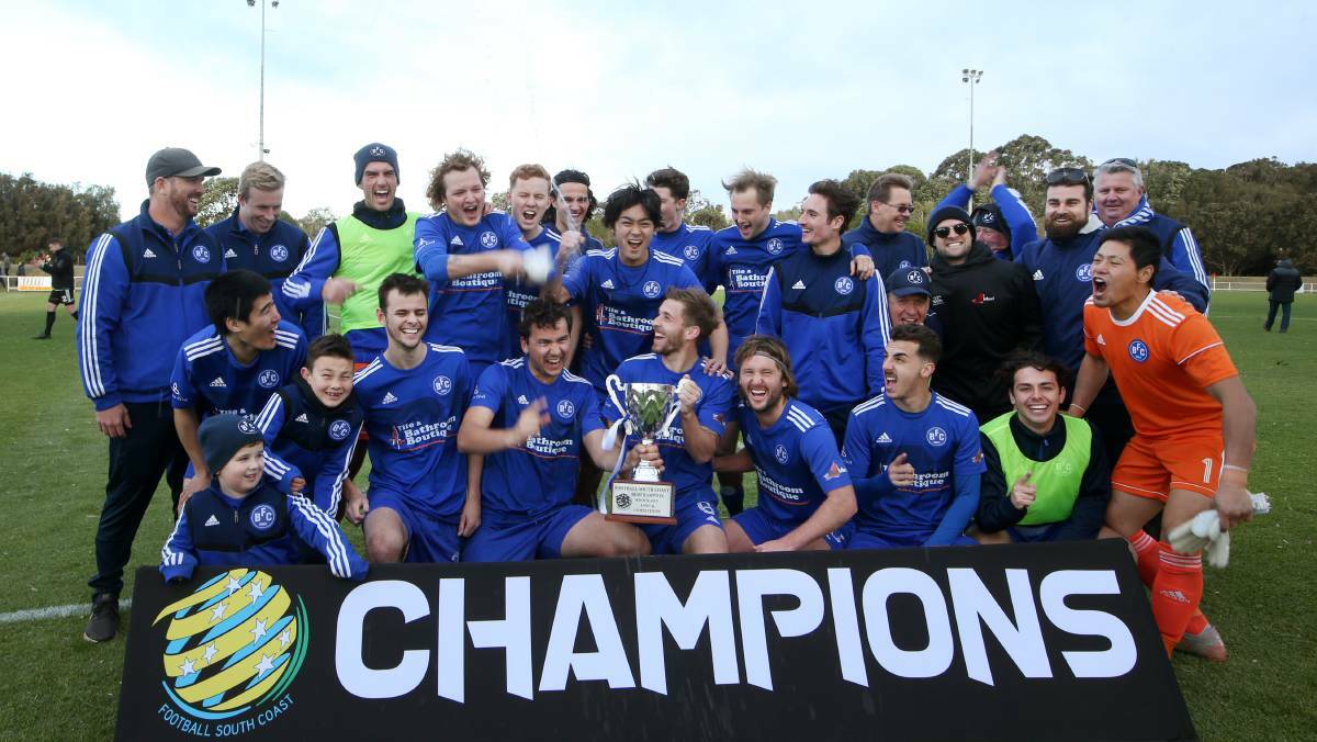 Bulli players celebrate after winning the 2019 Bampton Cup title. Picture: Sylvia Liber