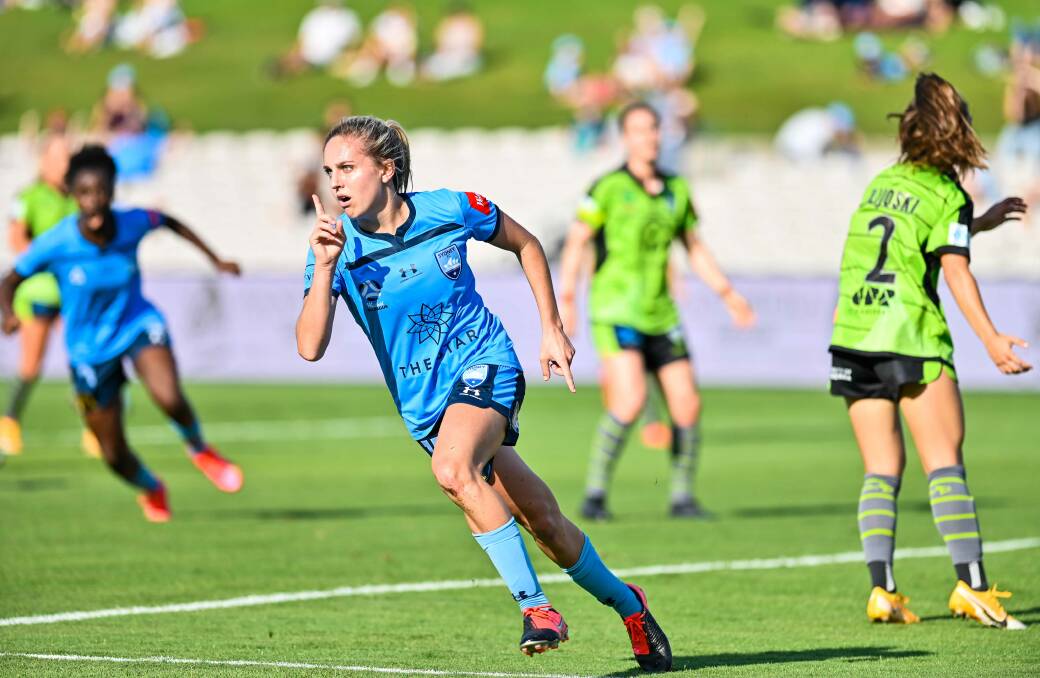 ON TARGET: Figtree's Mackenzie Hawkesby starts to celebrate after scoring a goal for Sydney FC against Canberra United. Picture: Keith McInnes