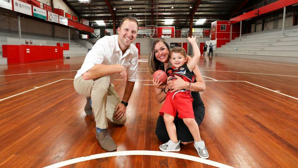 Hawks stalwart Tim Coenraad, with wife Nellie and son Tyson after he announced his retirement from professional basketball at the Snakepit last November. Picture: Adam McLean