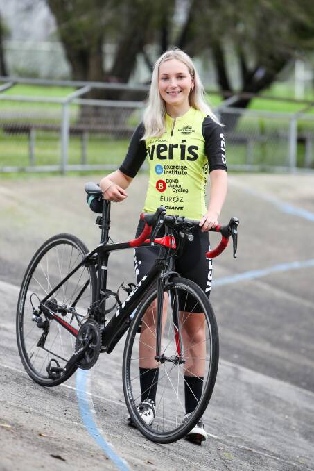 Albion Park teen Tahlia Dole, 17, with her bike. Picture: Adam McLean