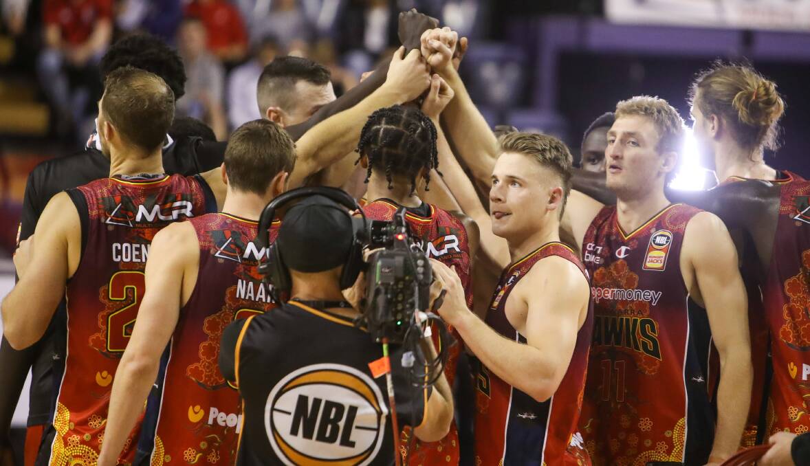 STICKING TOGETHER: The Illawarra Hawks. Picture: Adam McLean