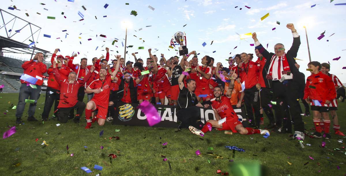 HIGHLIGHT: Rob Jonovski, his Corrimal players and support staff celebrate after winning the 2019 Premier League grand final. Picture: Anna Warr