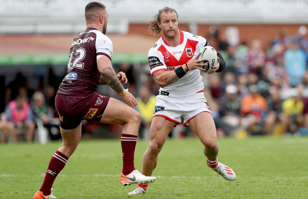 NEXT STEP: Dragons forward Korbin Sims takes on a Manly opponent. Picture: NRL Imagery