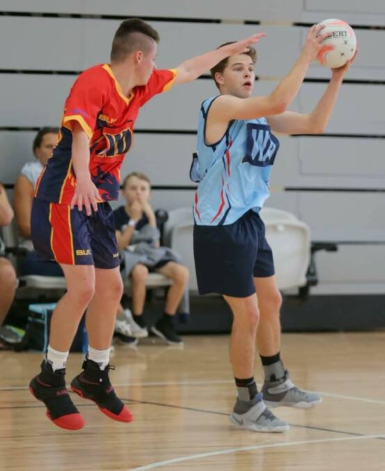 FOCUSED: Jack Edwards looks to grabs the ball. Picture: Netball NSW