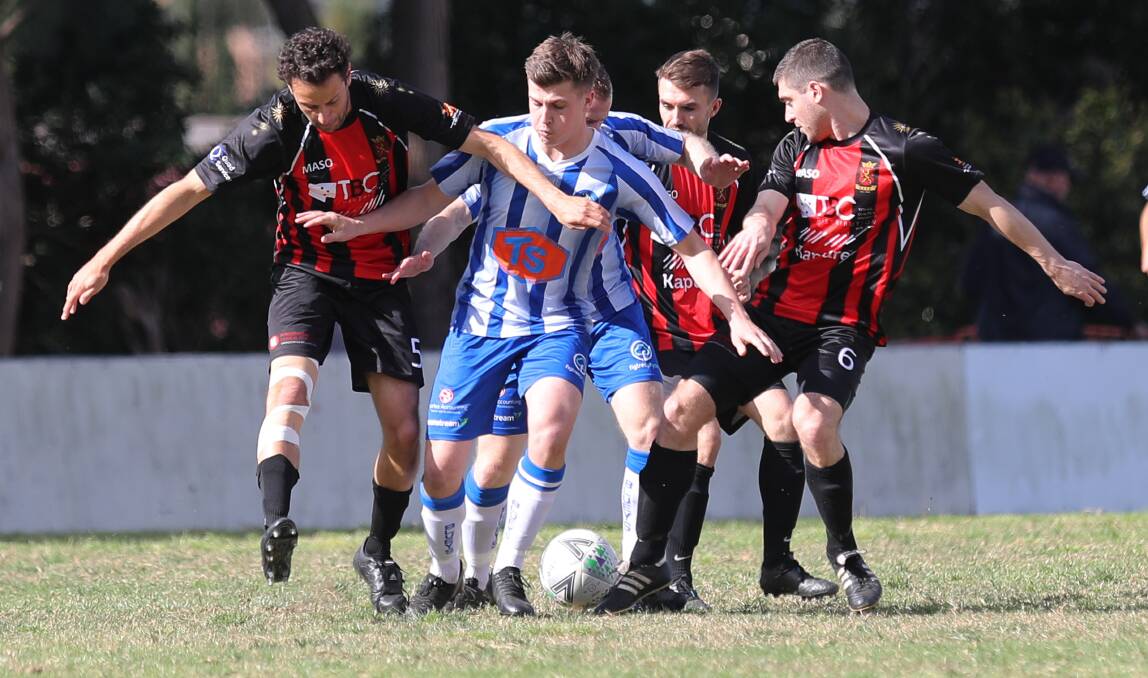 Action from Tarrawanna's 3-1 win over Cringila in the Illawarra Premier League at Tarrawanna Oval on Saturday afternoon. Pictures: Robert Peet