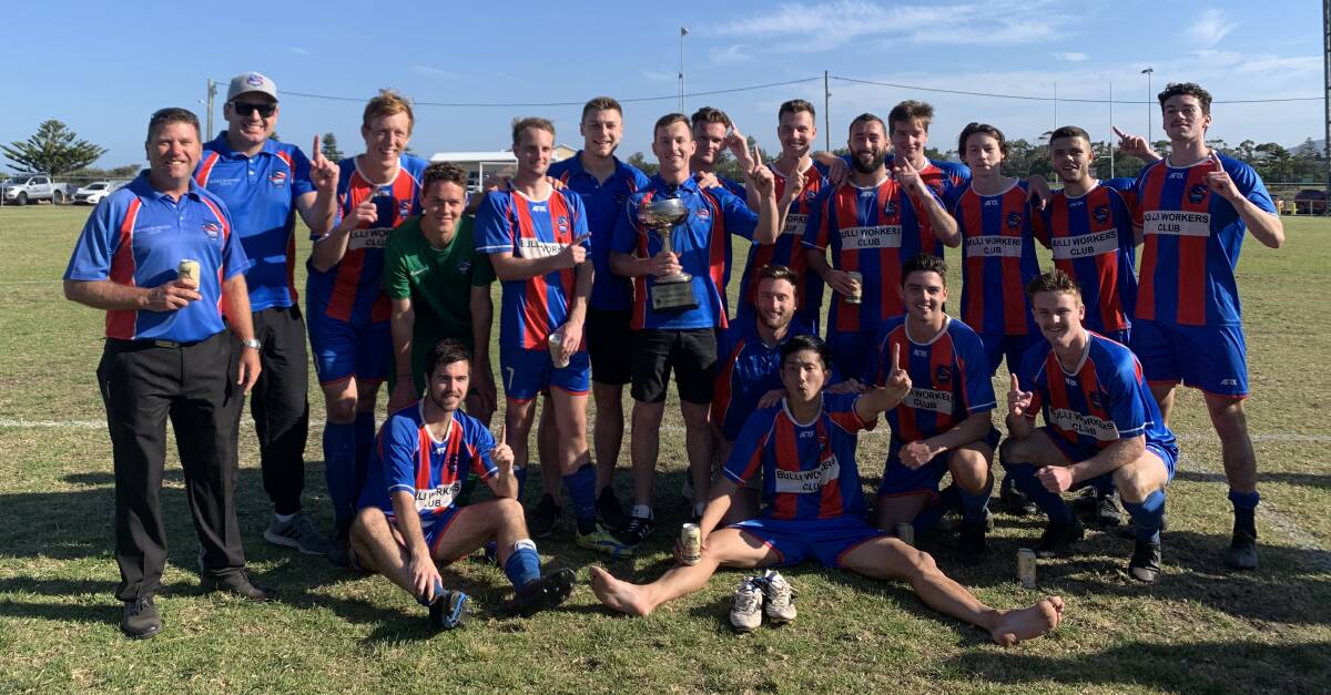 Woonona's Illawarra Premier League players and coaches celebrate after winning the premiers trophy on Sunday. Picture: Woonona Sharks