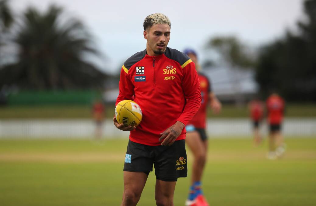 Action from the Gold Coast Suns' training session at North Dalton Park on Friday afternoon. Pictures: Sylvia Liber