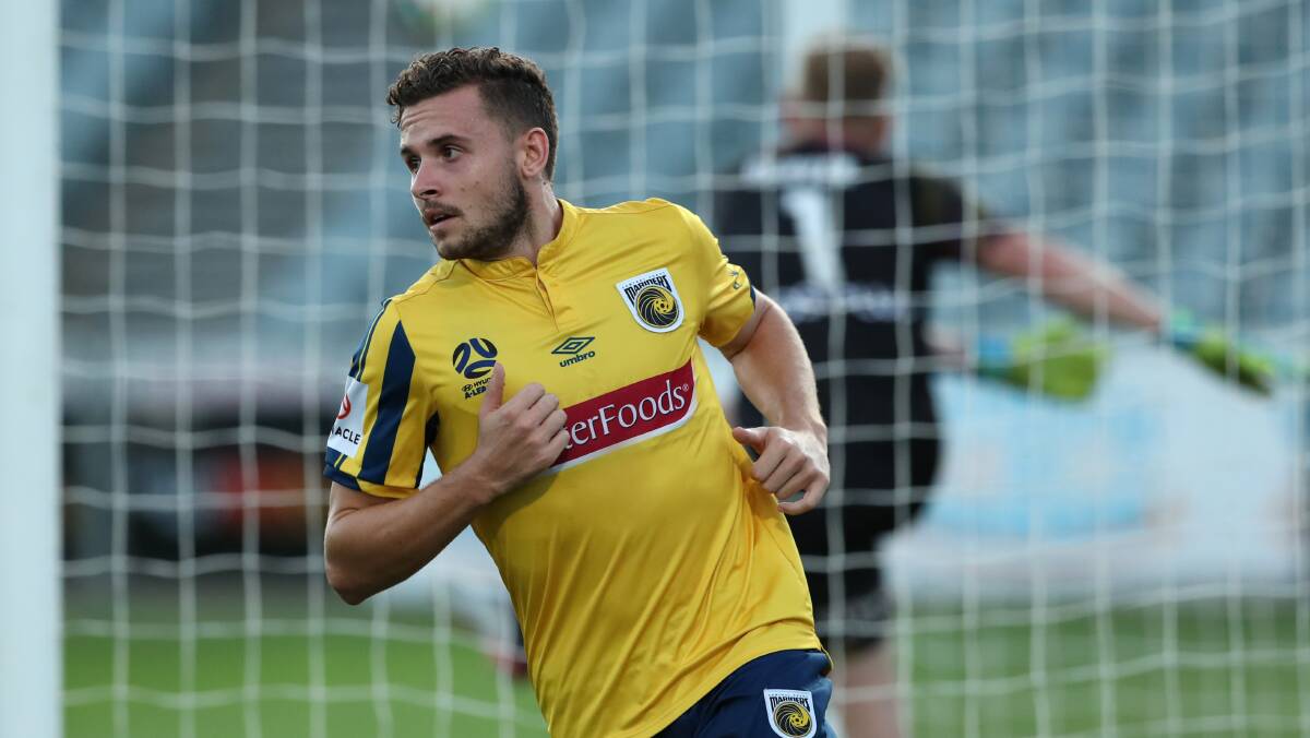 ON THE MOVE: Woonona's Jordan Murray scores a goal for Central Coast Mariners during his A-League stint. Picture: Tony Feder/Getty Images