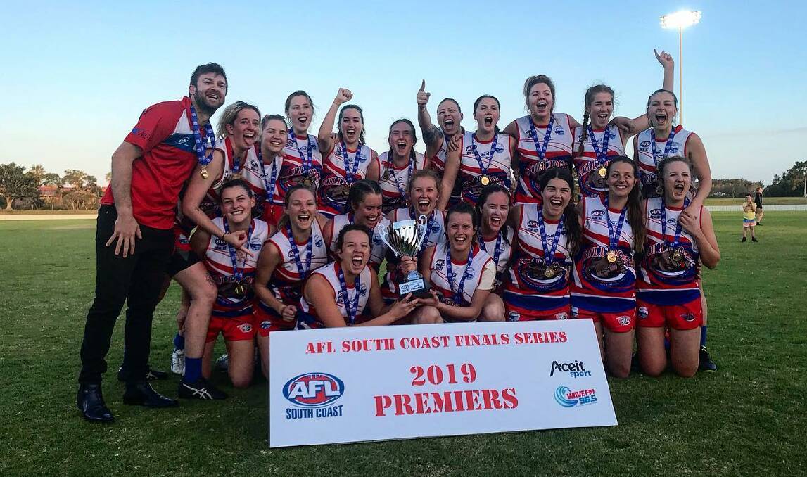 ECSTATIC: The Wollongong Bulldogs celebrate after winning last year's AFL South Coast Women's Premier Division title. Picture: AFL South Coast