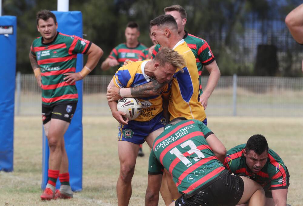 All of the action from the Group 7 first grade preliminary final between Warilla-Lake South and Jamberoo at Cec Glenholmes Oval on Saturday. Pictures: Robert Peet
