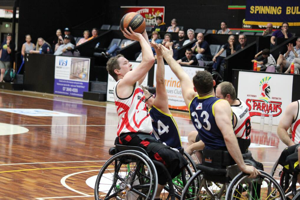 ON TARGET: Brett Stibners prepares to shoot for the Wollongong Roller Hawks. Picture: Geoff Adams