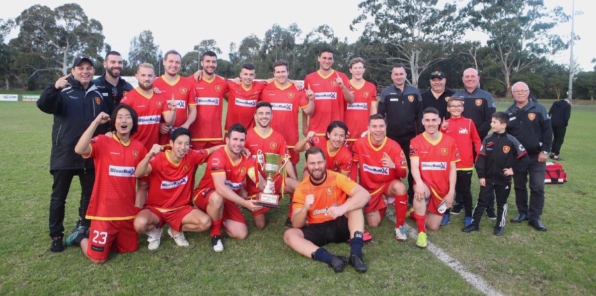 Wollongong United celebrate after winning the Frat Cup title in July. Picture: Sylvia Liber