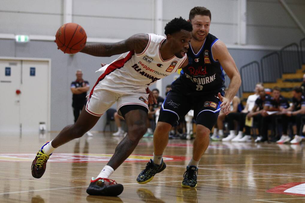 SURGING FORWARD: Antonius Cleveland drives towards the basket under pressure from Matthew Dellavedova during a NBL Blitz game last month. Picture: Daniel Pockett/Getty Images