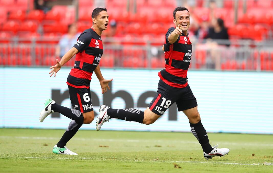 HE'S BACK: Former Wanderer Mark Bridge (right) celebrates after scoring a goal. The 34-year-old has joined the Corrimal Rangers in 2020. Picture: Getty Images