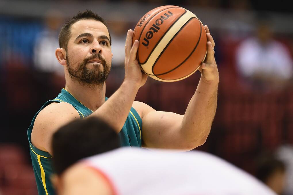 ON TARGET: Tristan Knowles prepares to shoot for the Australian Rollers against Turkey in Tokyo four years ago. Picture: Matt Roberts/Getty Images