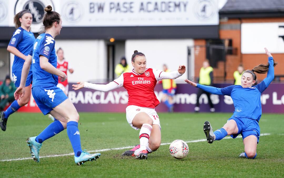 HAPPY IN RED: Caitlin Foord scores on her Arsenal debut. Picture: Tess Derry/EMPICS/PA Images via Getty Images