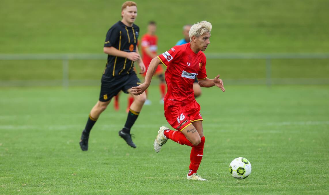 Jeremy Flanagan shapes as a key figure for Wollongong United on Tuesday night. Picture by Wesley Lonergan