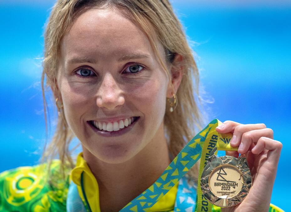 GOLDEN GIRL: Emma McKeon with her gold medal after winning the women's 50m butterfly final in Birmingham. Picture: Tim Clayton/Corbis via Getty Image