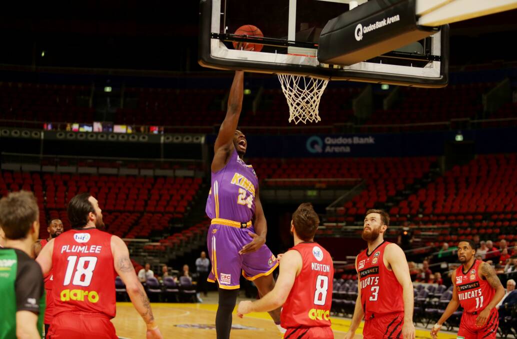 Kings player Jae'Sean Tate drives towards the basket during the grand final series against Perth Wildcats. Picture: Chris Lane