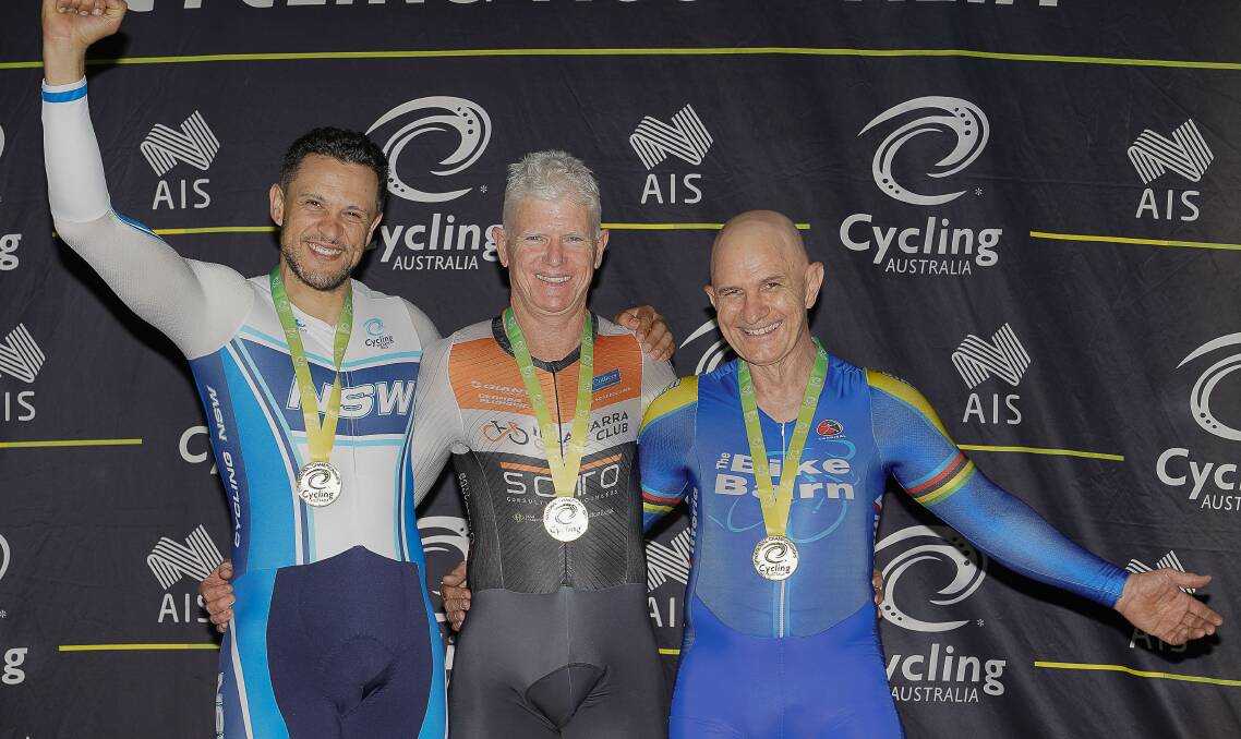 Gary Mandy (left) celebrates with his fellow victorious Team Parrawanna team members. Picture: Chris Seen Photography