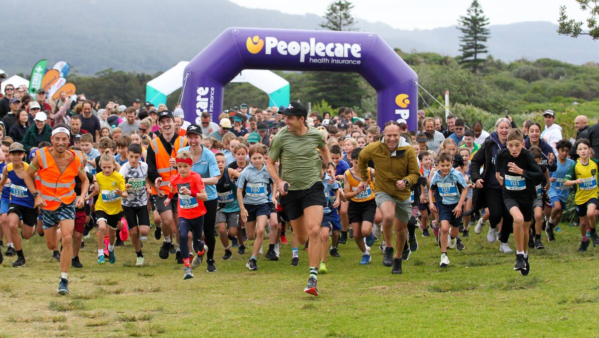 Participants get the 2km fun run under way at last year's Wollongong Running Festival at JP Galvin Park, North Wollongong. Picture by Anna Warr