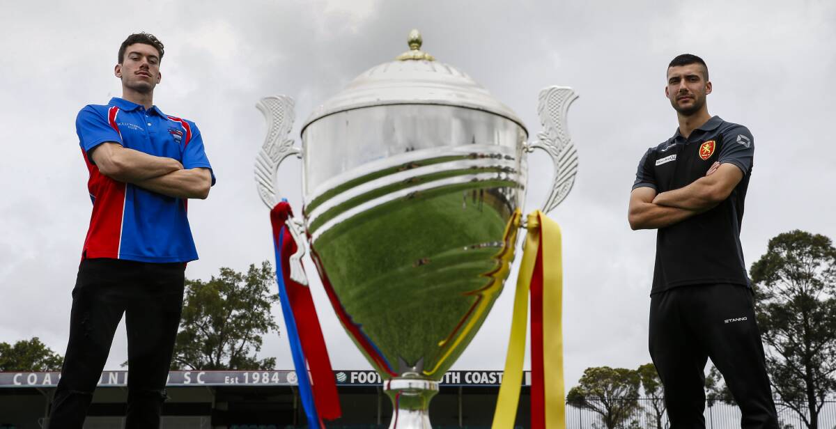 UP FOR GRABS: Woonona's Taro Regan Williams and United captain Danny Lazarevski with the Illawarra Premier League trophy. Picture: Anna Warr