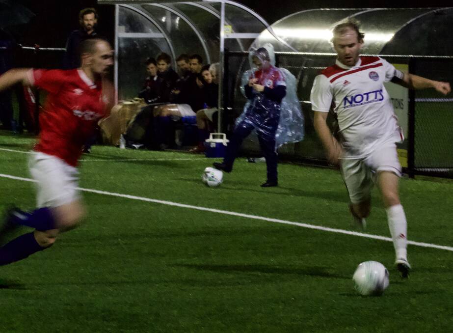 ON THE BALL: White Eagles captain Chris Nathaniel finds some space against South Coast United on Saturday night. Picture: Kyle Potts