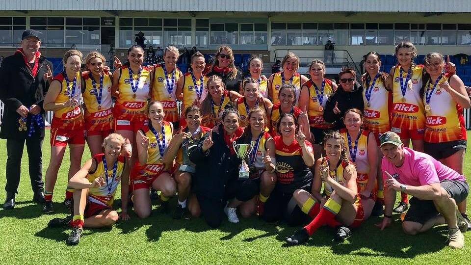 The Suns celebrate after winning the Women's Division One premiership. Picture: AFL South Coast