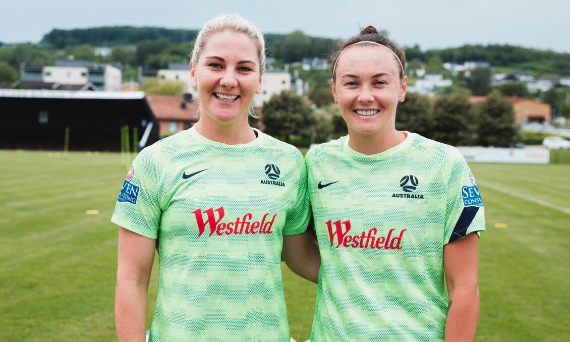 REUNITED: Illawarra duo Caitlin Cooper and Caitlin Foord after a Matildas training session in Sweden. Picture: Ann Odong/Football Australia