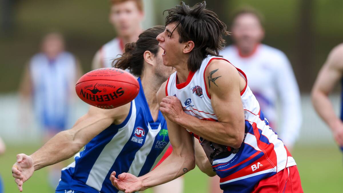 All of the action from the AFL South Coast Men's clash between Wollongong Bulldogs and Figtree Kangaroos at Keira Oval. Pictures by Adam McLean