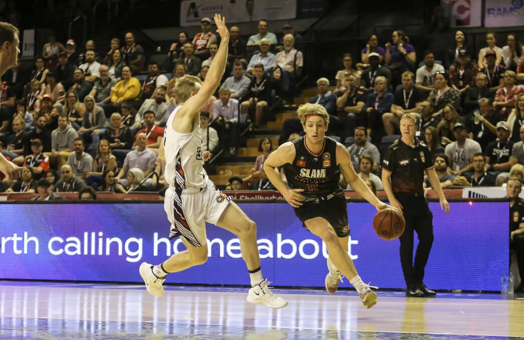 Daniel Grida takes on an Adelaide 36ers opponent in Wollongong. Picture: Anna Warr