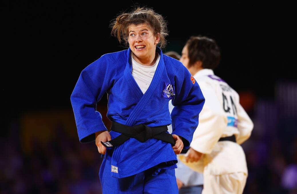 DIGGING DEEP: Tinka Easton reacts during the women's 52kg judo final. Picture: Dean Mouhtaropoulos/Getty Images