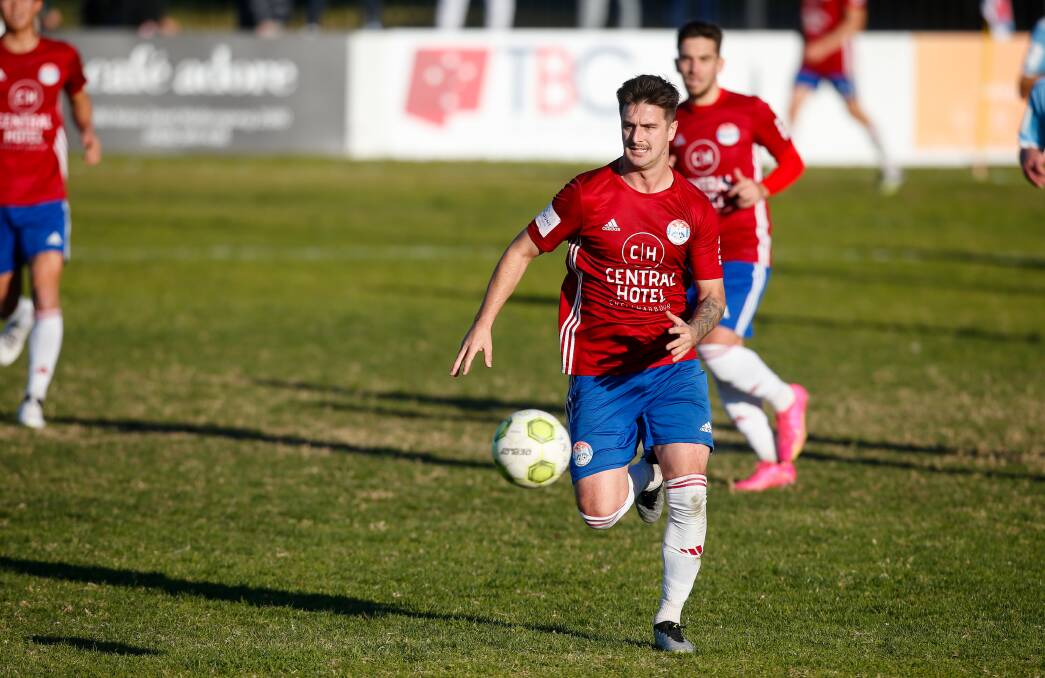 Striker Cameron Morgan leads the chase towards the ball during a Premier League match against Wollongong Olympic last year. Picture by Anna Warr