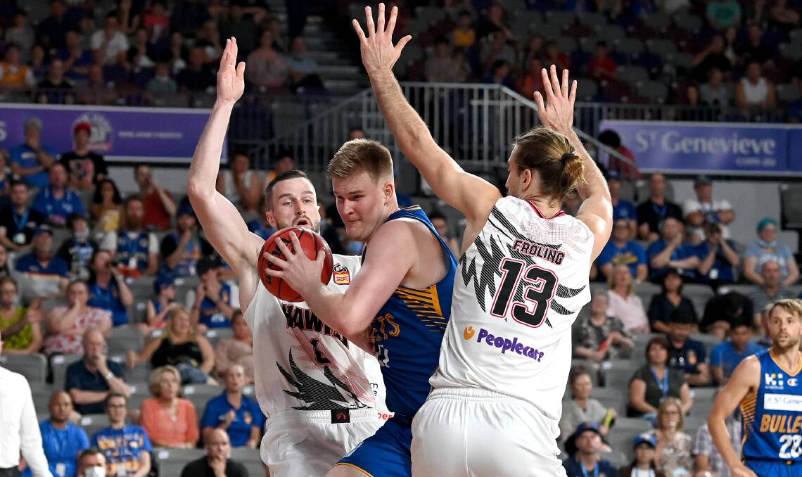TEAMWORK: Former Bullets big man Harry Froling will be joining brother Sam (right) in Wollongong next season. Picture: Bradley Kanaris/Getty Images