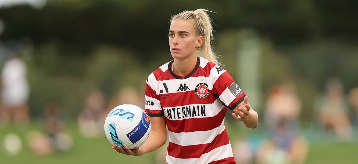 Wanderers defender Danika Makos prepares to do a throw-in in during a game against the Jets last season. Picture by Ashley Feder/Getty Images
