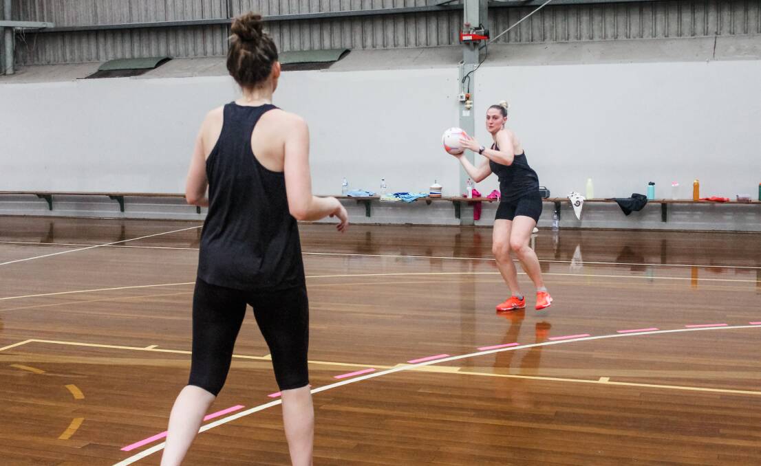 ON TARGET: Brittany Berry prepares to pass the ball to a Blaze teammate at training. Picture: South Coast Blaze