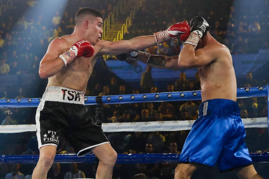 ON THE MARK: Wollongong's Tyler Sargent-Wilson lands a blow against opponent Steven Rados on Wednesday night. Picture: Adam McLean