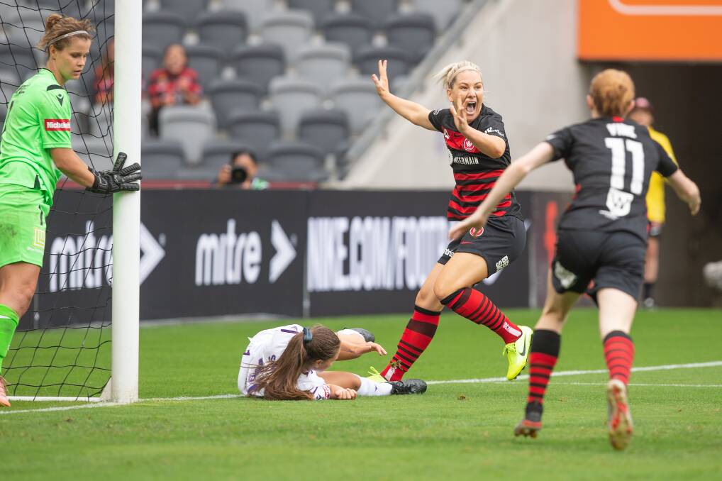 PASSIONATE: Caitlin Cooper reacts to a decision while representing the Western Sydney Wanderers last season. Picture: WS Wanderers
