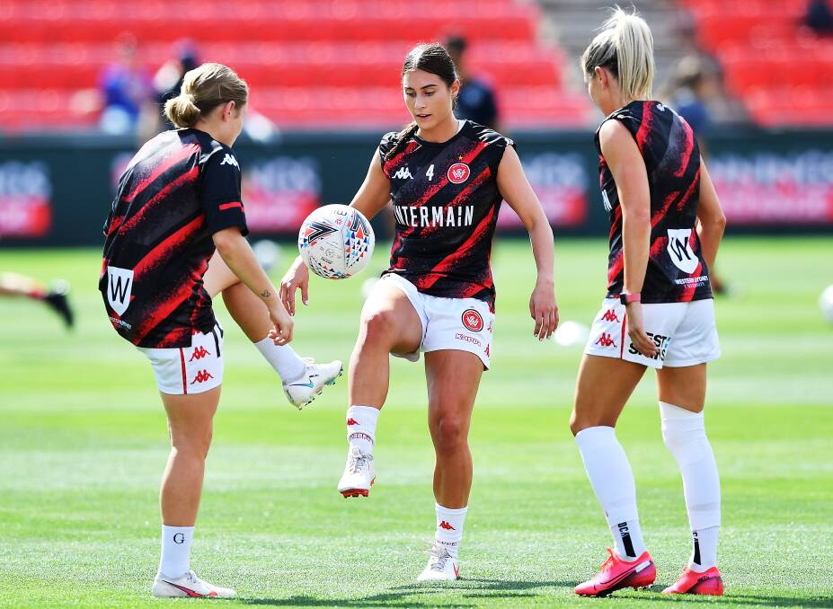 IN FOCUS: Margaux Chauvet (centre) trains with her Wanderers teammates. Picture: Mark Brake/Getty Images