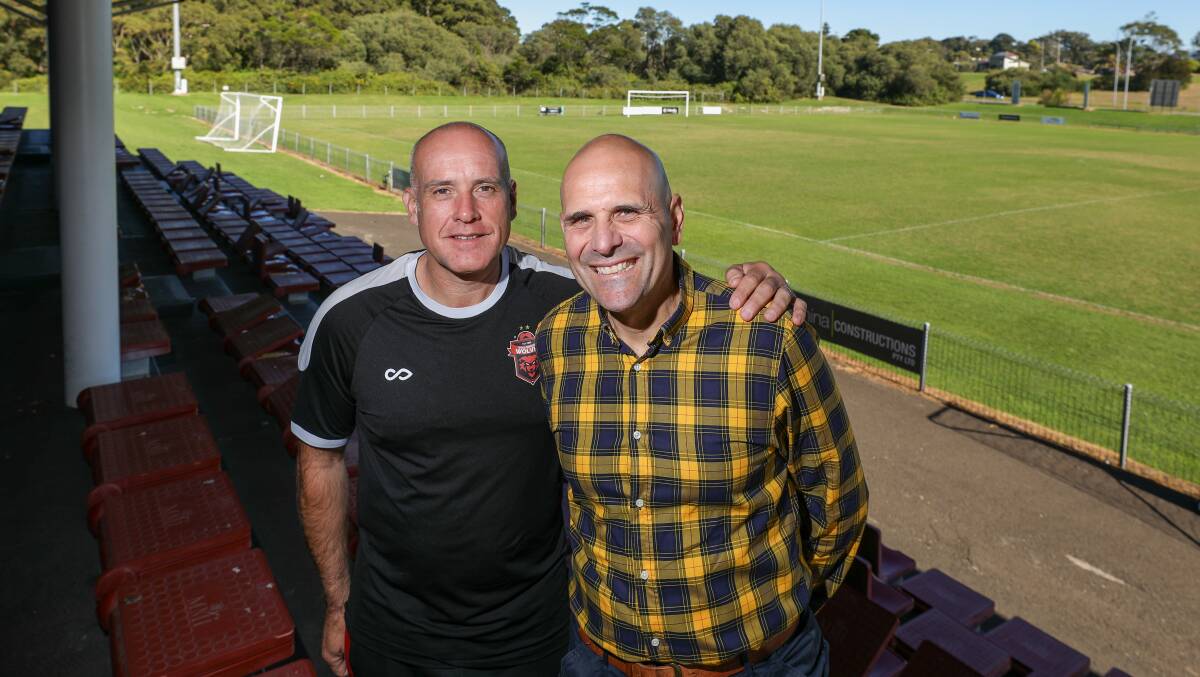 Mariners mindset coach Ezio Mormile (right) catches up with Wollongong Wolves technical director Neil Mann at Albert Butler Park. Picture by Adam McLean