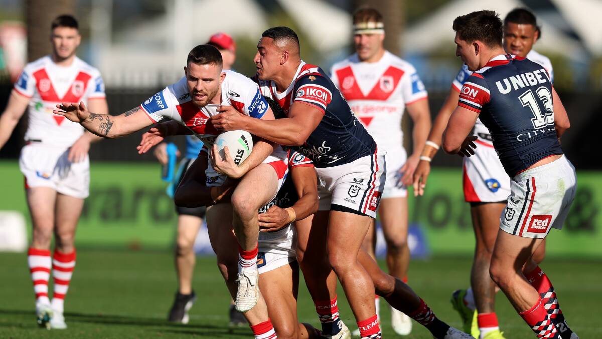 Billy Burns runs the ball forward while representing St George Illawarra against the Roosters in 2022. Picture by Scott Gardiner/Getty Images