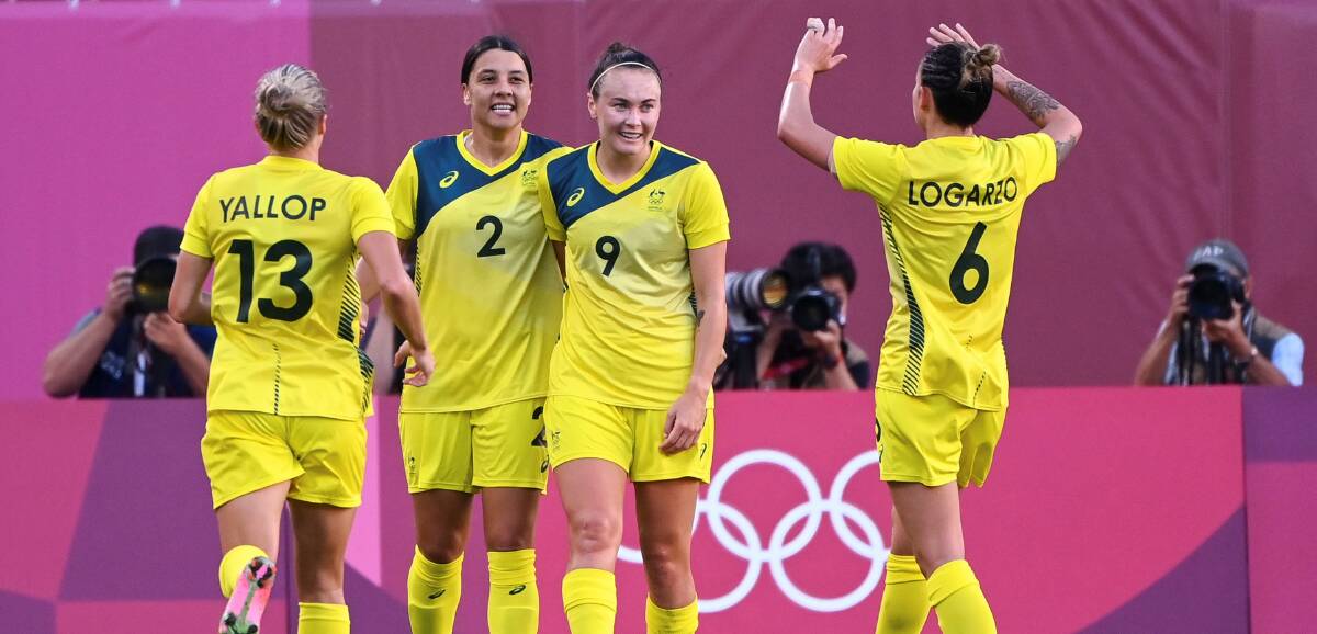 MOVING FORWARD: Sam Kerr celebrates with her Australian teammates after scoring against the US in their bronze medal match. Picture: Lu Yang/Xinhua via Getty Images